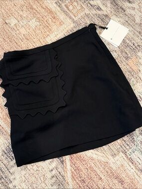 Victoria Beckham Black Mini Skirt with Scalloped Pocket Layers